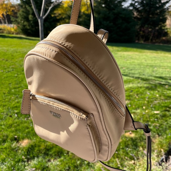 Guess Handbags - Guess tan backpack